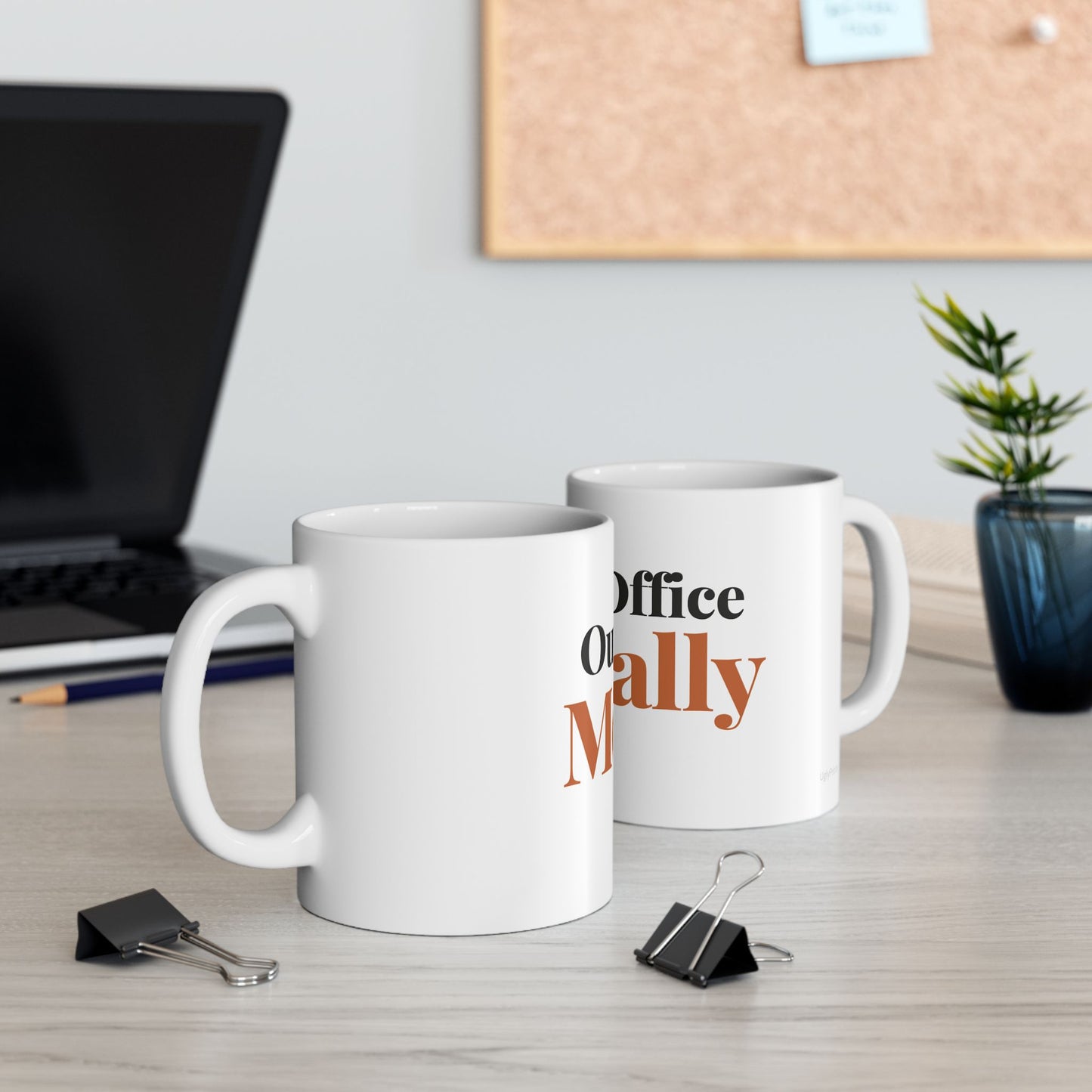 Out Of Office Mentally funny typography mugs on a modern office desk with laptop cork board and plant