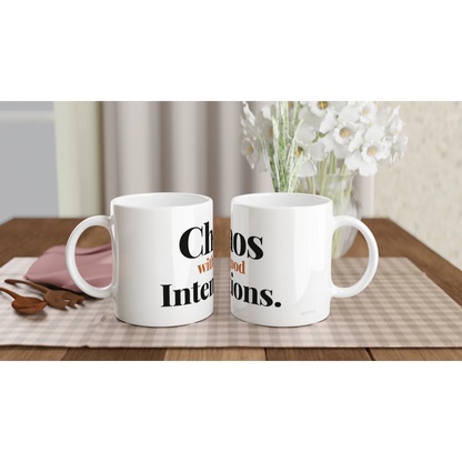 Chaos With Good Intentions funny typography mugs on table with flowers lifestyle setting