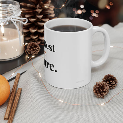 I Work Best Under Pressure funny office mug styled in a warm cosy setting with pine cones cinnamon and fairy lights