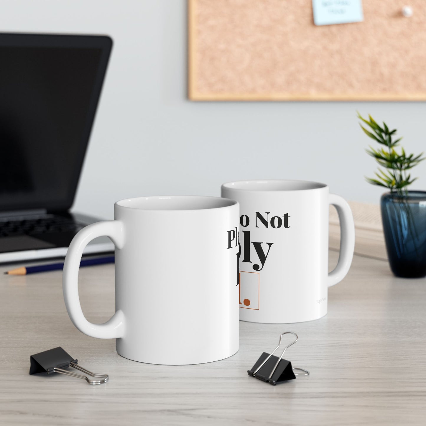 Please Do Not Reply All funny typography mugs on a modern office desk with laptop cork board and plant
