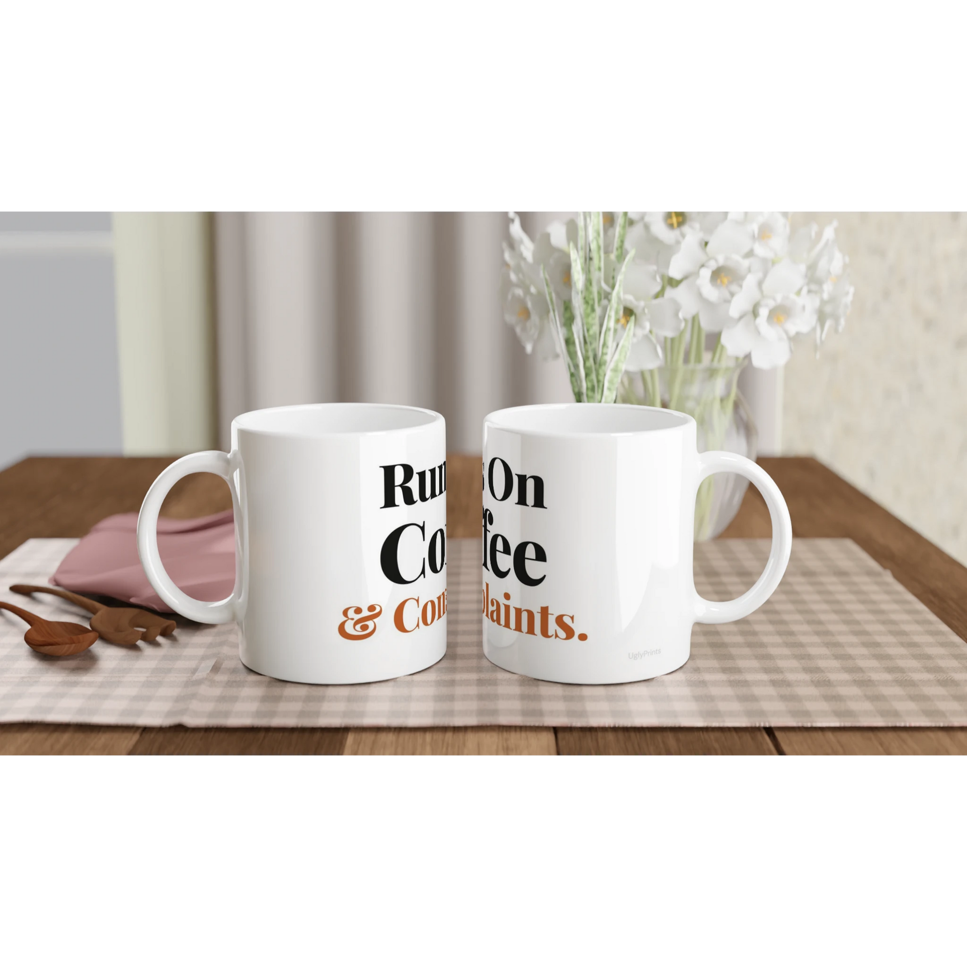 Runs On Coffee And Complaints funny typography mugs on table with flowers lifestyle setting
