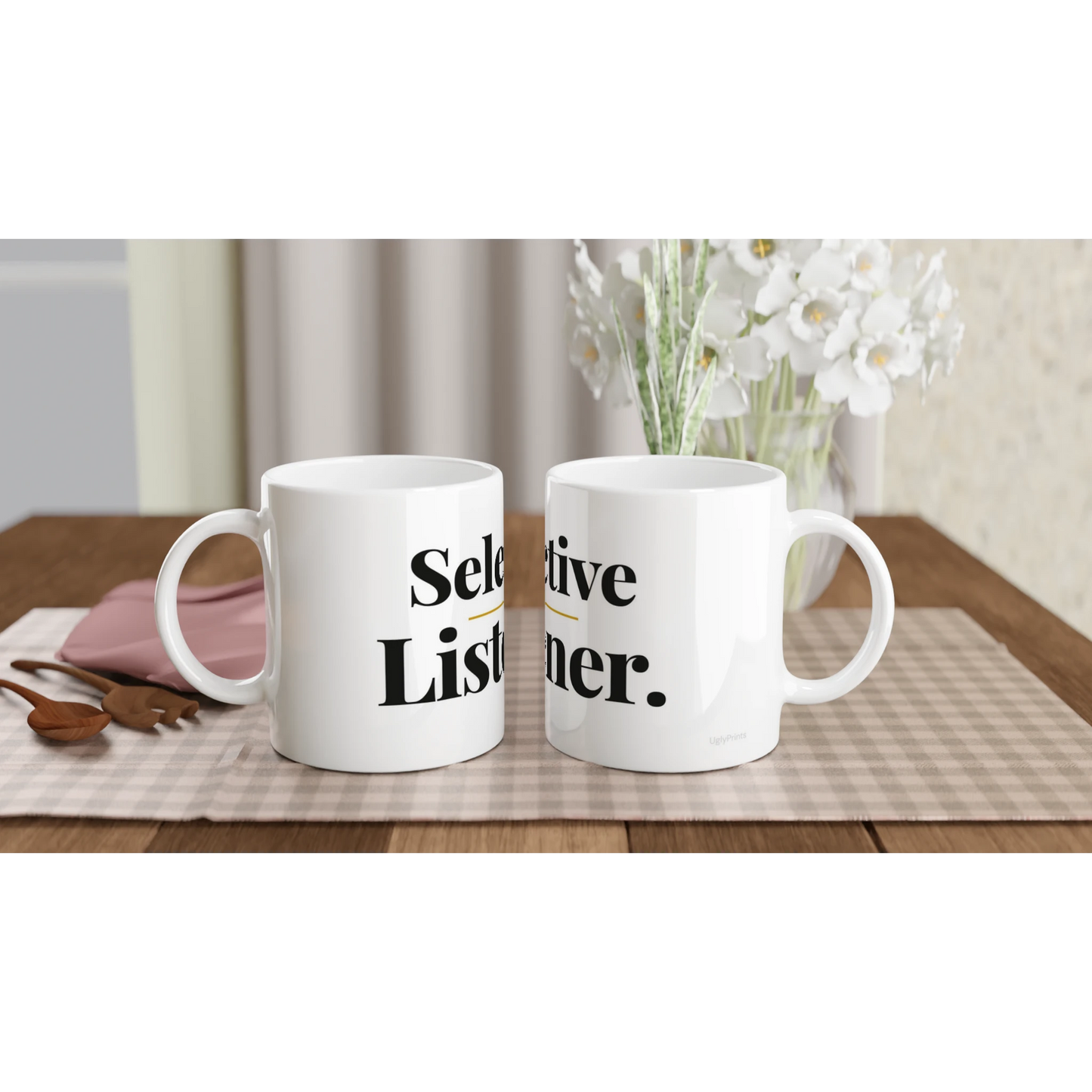Selective Listener funny typography mugs on table with flowers lifestyle setting