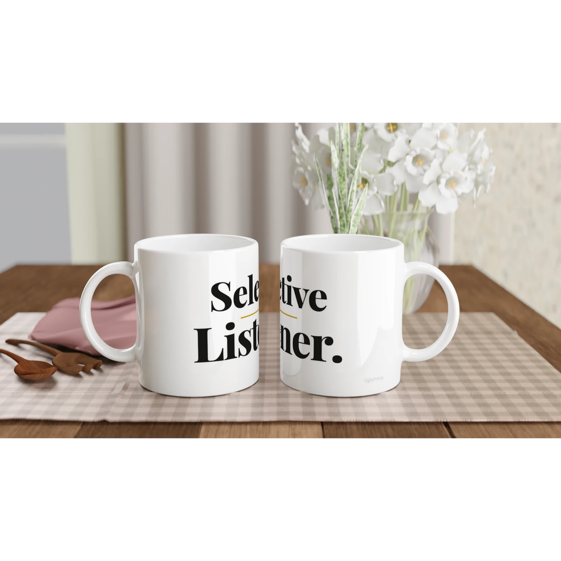 Selective Listener funny typography mugs on table with flowers lifestyle setting
