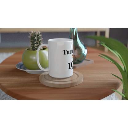 Turning Fine Since 1976 funny birthday mug on wooden tray with plant lifestyle setting