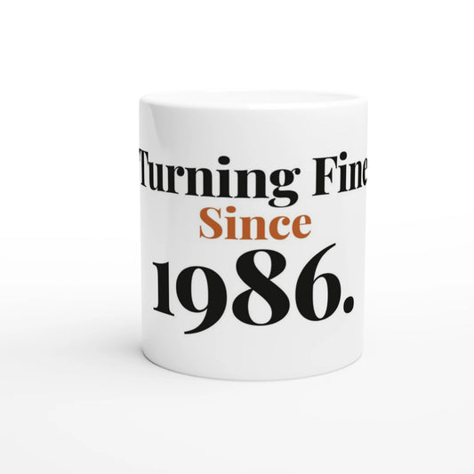Turning Fine Since 1986 — 11oz white ceramic funny birthday mug front view