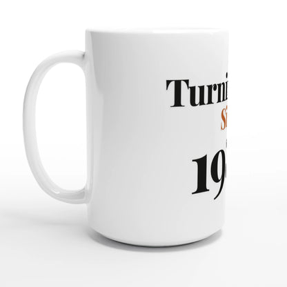 Turning Fine Since 1986 — 15oz white ceramic funny birthday mug angled side view