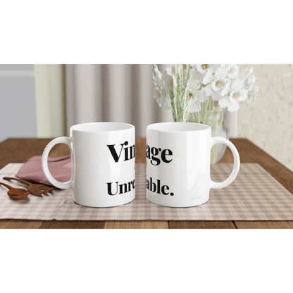 Vintage And Unreliable funny birthday mugs on table with flowers lifestyle setting