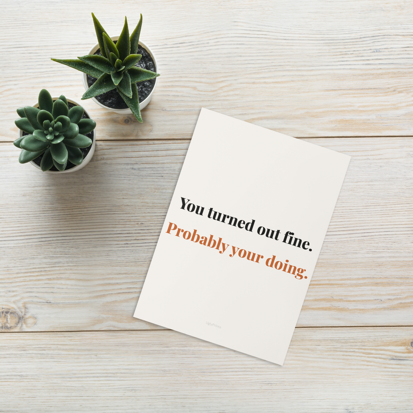 You Turned Out Fine funny typography Mothers Day card on desk with plant
